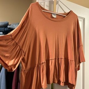 Burnt orange ruffled top
